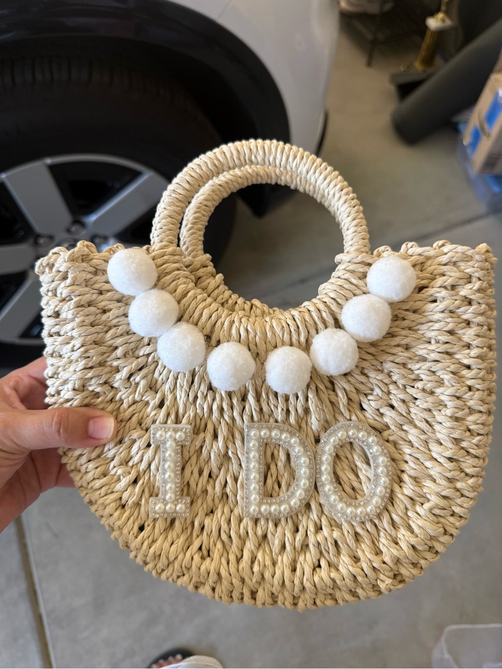 Straw Woven Circle-Handle Tote with White Pom Trim